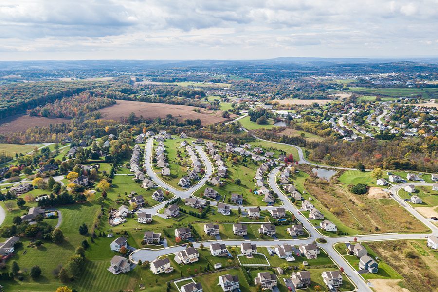 Contact - Aerial View of a New Construction in a Suburban Neighborhood in Pennsylvania During Fall